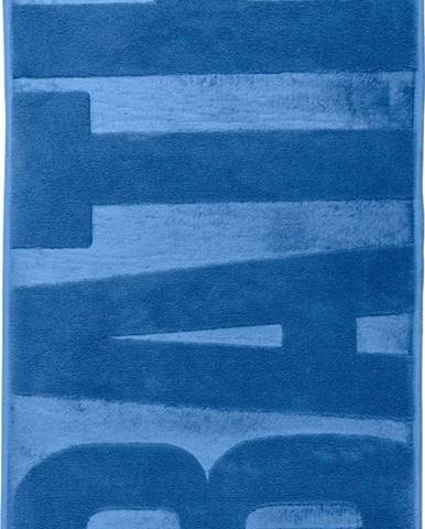 Modrá koupelnová předložka s paměťovou pěnou Wenko, 80 x 50 cm