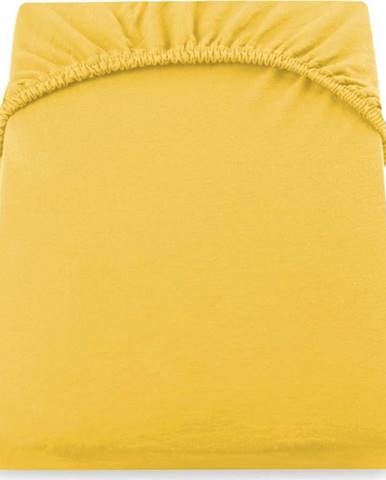 Žluté džersejové prostěradlo DecoKing Amber Collection, 80/90 x 200 cm