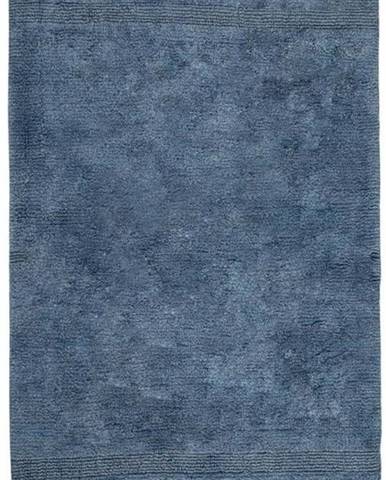 Modrá bavlněná koupelnová předložka Irya Home Collection Paloma, 70 x 110 cm