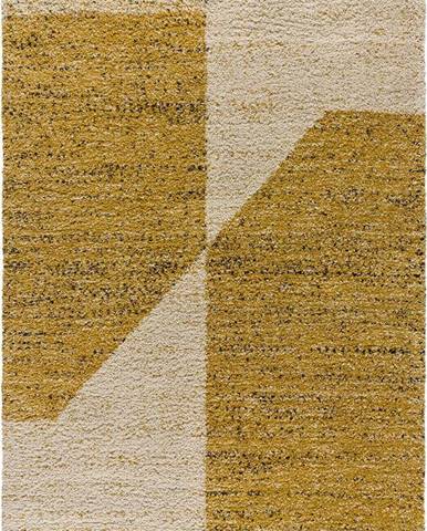 Hořčicově žlutý koberec Universal Ikone, 133 x 190 cm