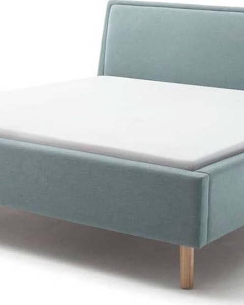 Meise Möbel Modrá čalouněná dvoulůžková postel s úložným prostorem s roštem 180x200 cm Frieda – Meise Möbel